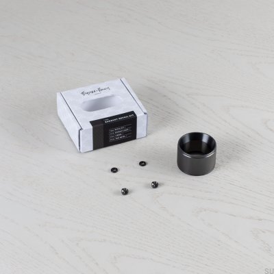 Kit de decoração de lâmpada em aço linear com detalhes de escapamento e acabamento em tom de metal.