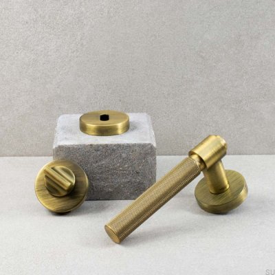 Puxador de porta Helix 200 em metal bronze antigo, estilo escandinavo.