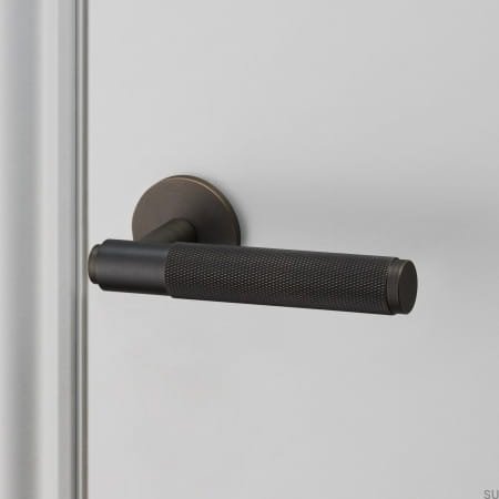 buster_punch_door_lever_handle_smoked_sprung_web_4.jpg