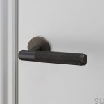 buster_punch_door_lever_handle_smoked_sprung_web_4.jpg