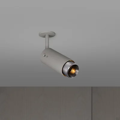 Farol auxiliar ajustável Exhaust Cross, cinza aço com detalhes prateados.