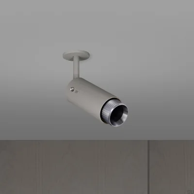 Farol auxiliar ajustável Exhaust Cross, cinza aço com detalhes prateados.