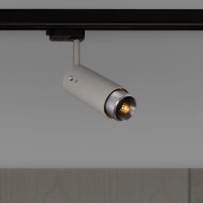 Farol auxiliar de longo alcance Exhaust Cross Track, cinza aço com detalhes prateados.