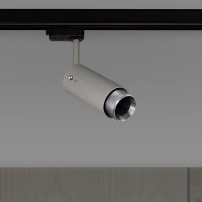 Farol auxiliar de longo alcance Exhaust Cross Track, cinza aço com detalhes prateados.