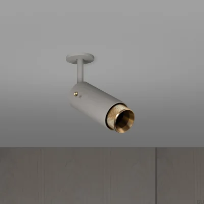 Farol auxiliar ajustável Exhaust Cross, cinza aço com detalhes em latão.