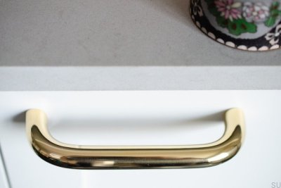 Puxador alongado para móveis Grip 143, latão polido