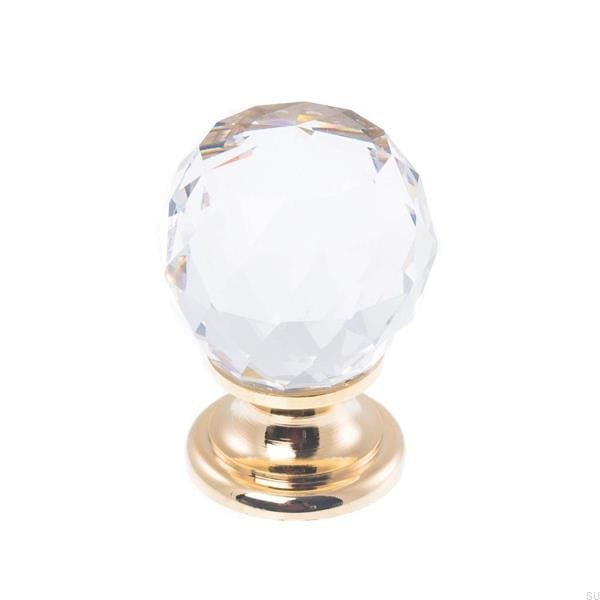 Zdjecie galki krysztalowej na zlotej stopie